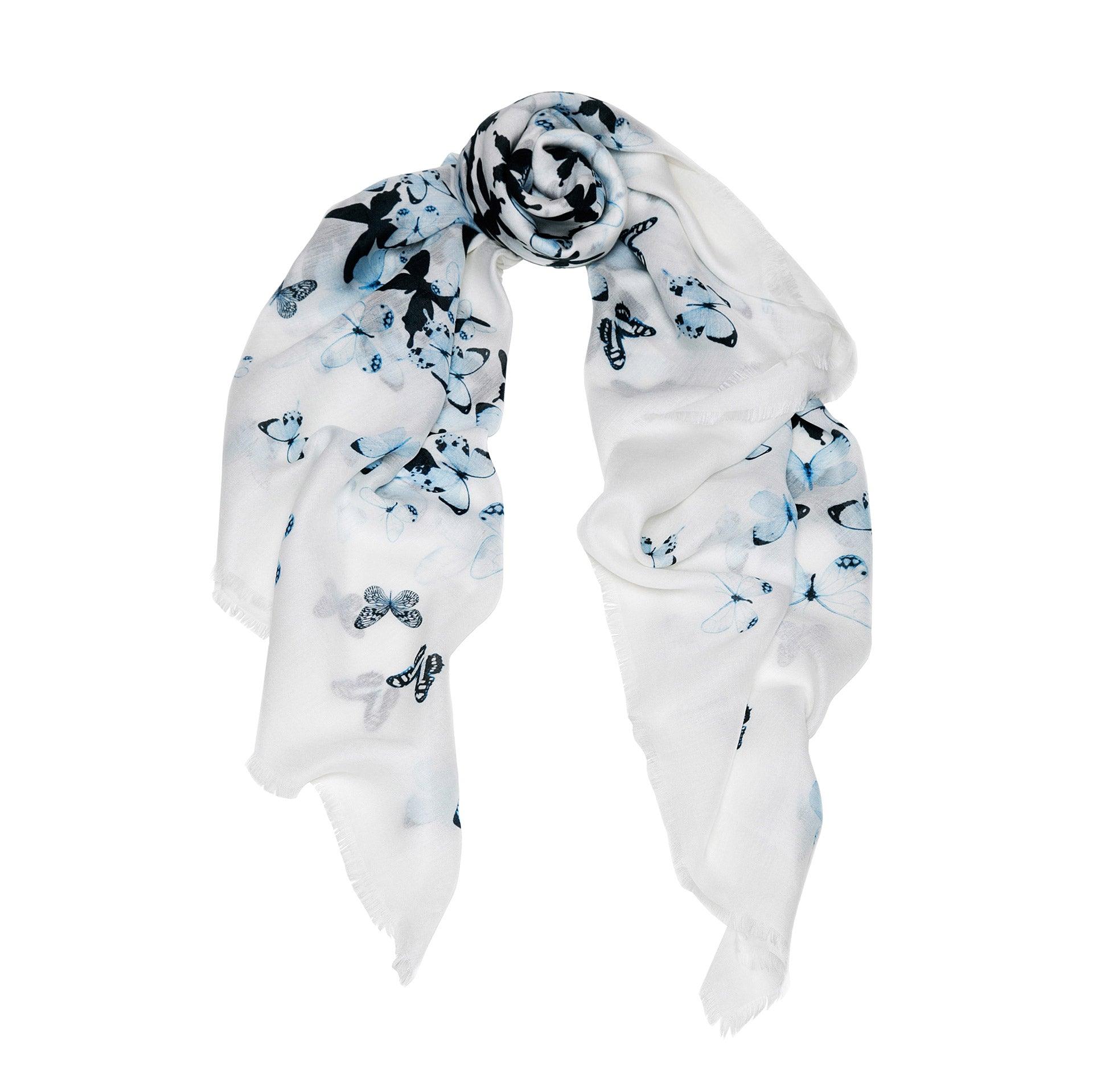 Sky Blue Butterflies Cashmere Blend Scarf - Fusion of London's design and Italian craftsmanship, a luxurious gift choice.