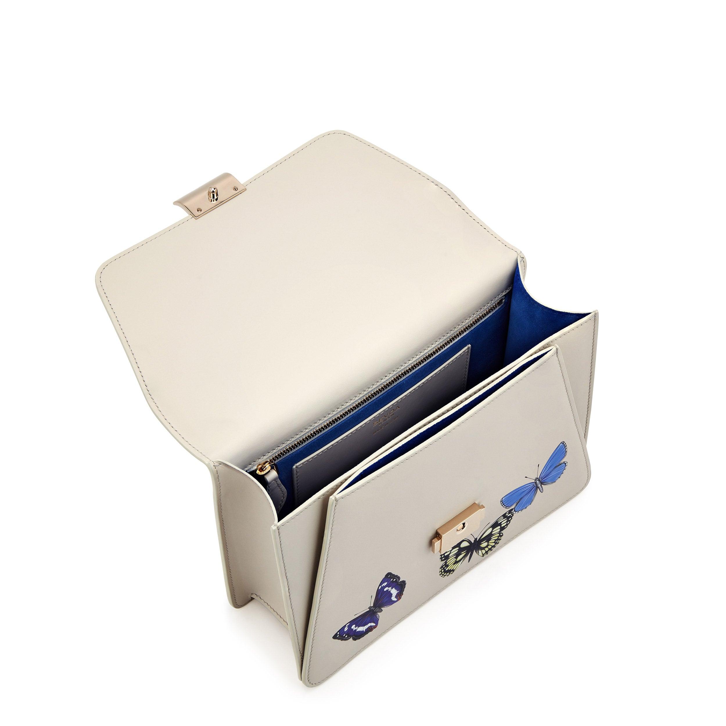 Off White Butterfly Designer Shoulder Bag with Gold Chain - A fusion of London's flair and Italian craftsmanship.