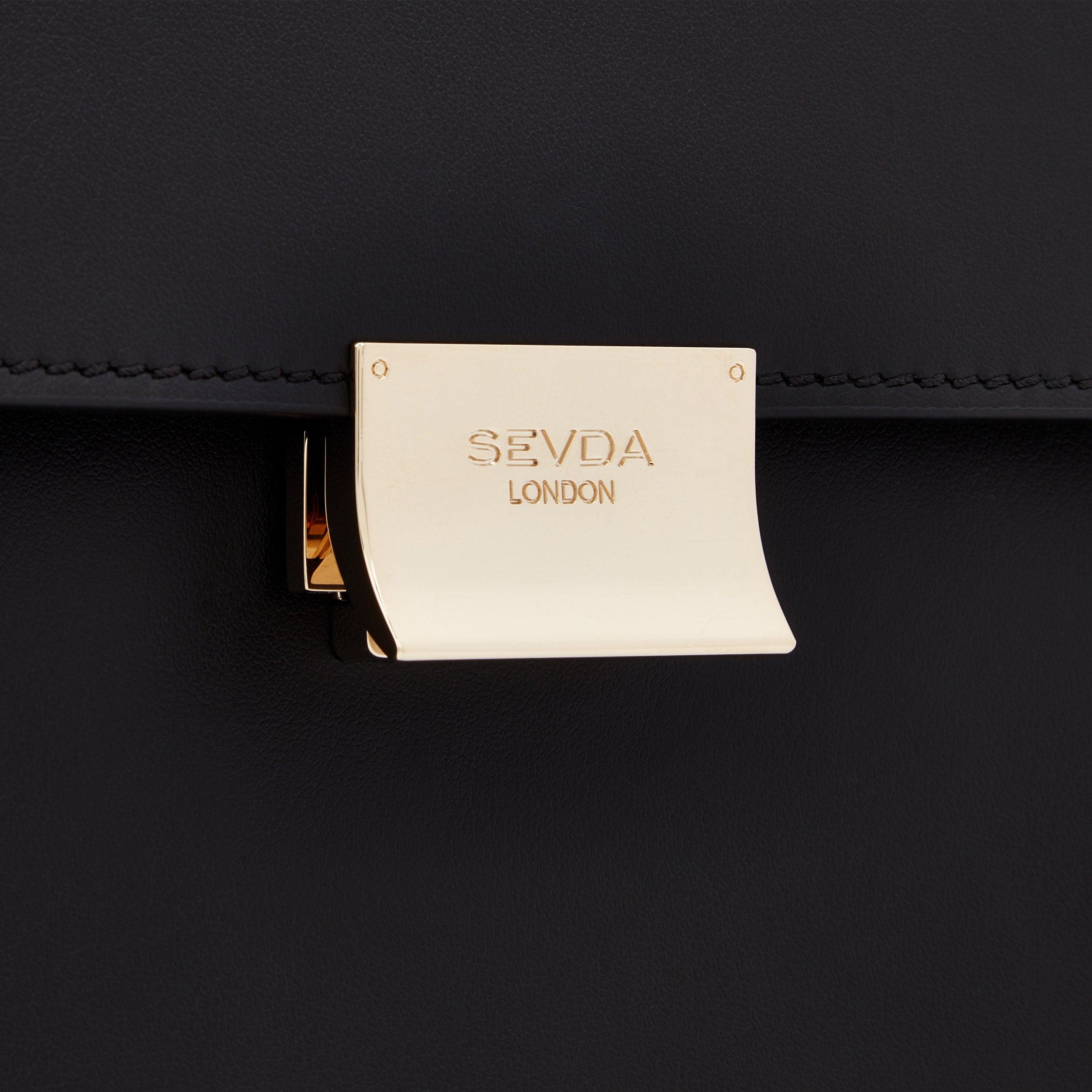 Black Designer Shoulder Bag with Gold Chain - Where London fashion meets Italian craftsmanship.