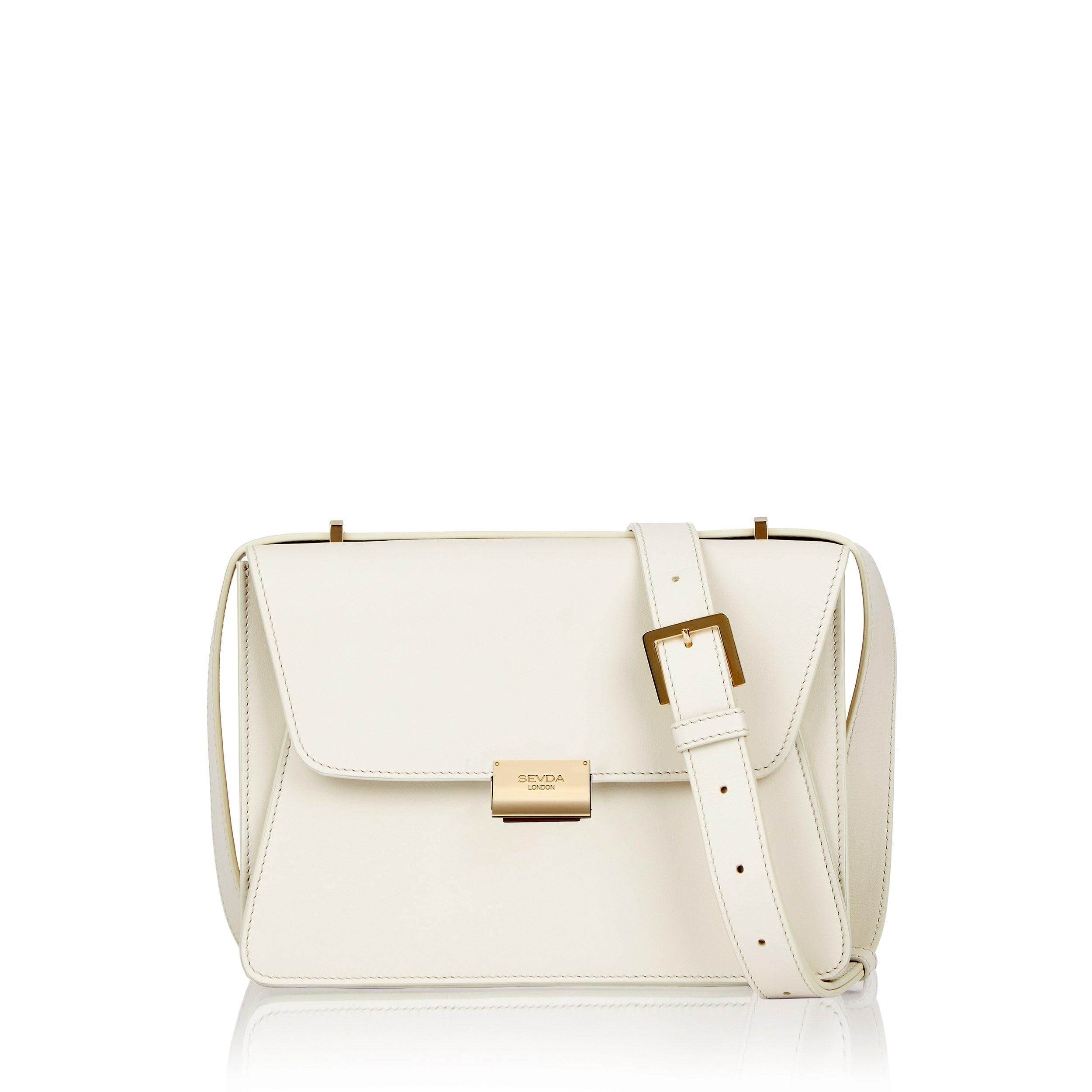 Off White Designer Shoulder Bag with Blue Suede Lining - The fusion of London style and Italian craftsmanship.