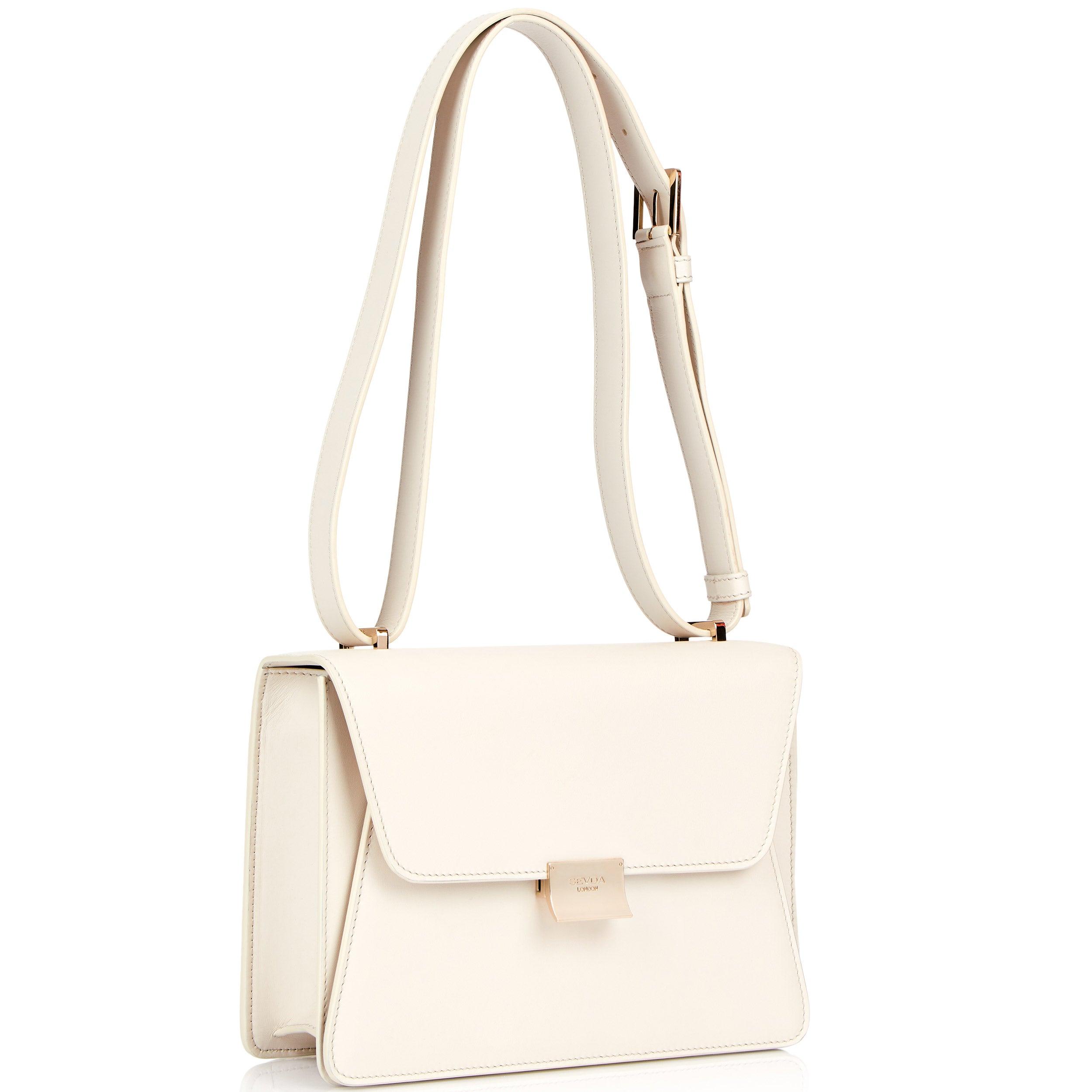 Off White Designer Shoulder Bag with Blue Suede Lining - The fusion of London style and Italian craftsmanship.