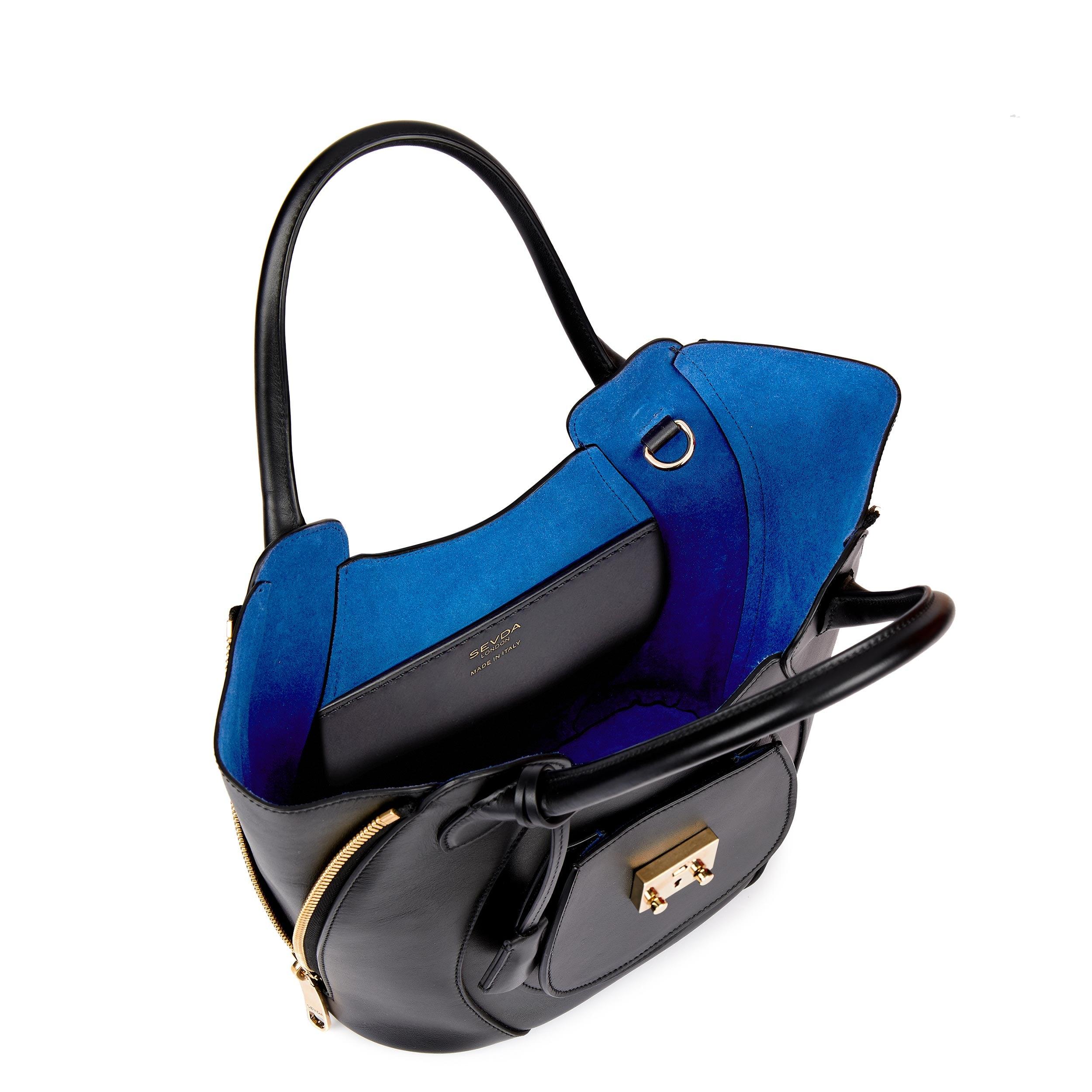 Black Leather Luxury Designer Bag with Blue Suede Lining - Fusion of London's style and Italian craftsmanship.