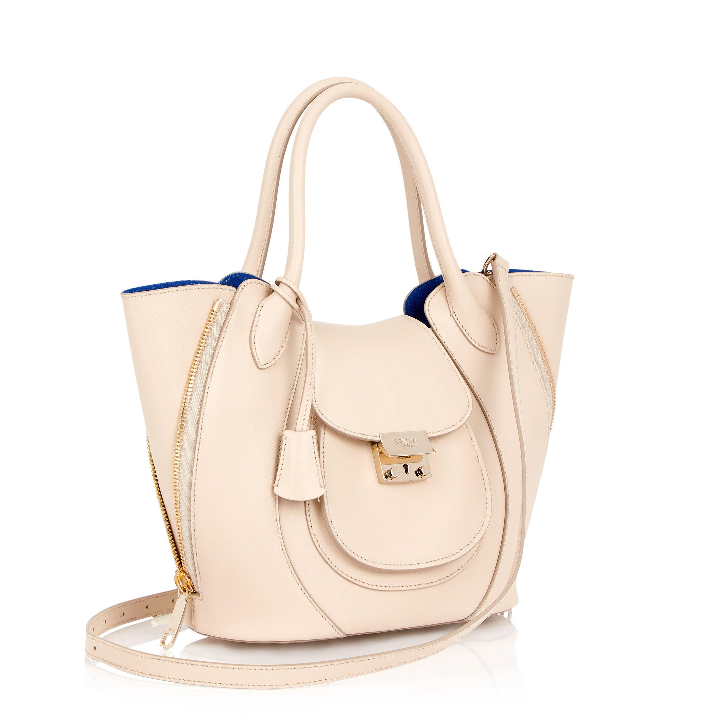 Ivory Leather Luxury Designer Bag with Blue Suede Lining - Fusion of London's style and Italian craftsmanship.