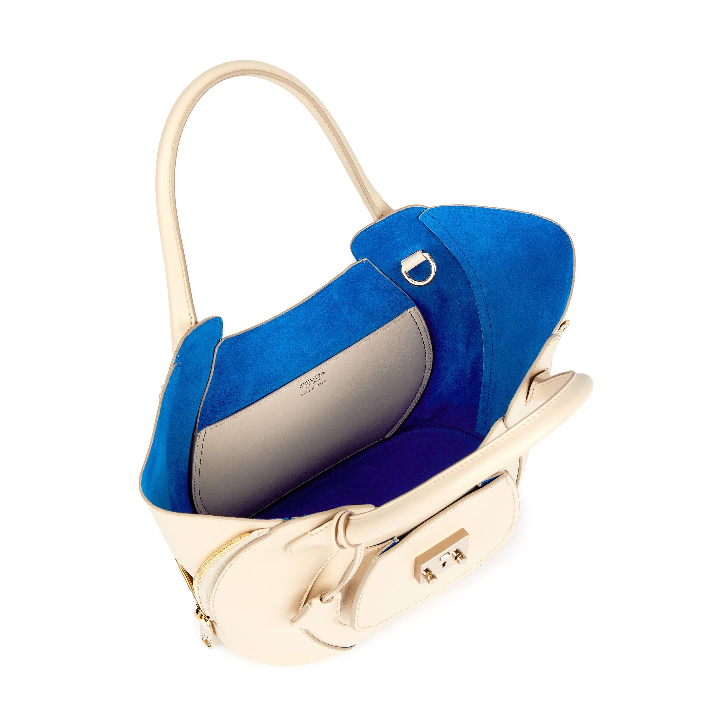 Ivory Leather Luxury Designer Bag with Blue Suede Lining - Fusion of London's style and Italian craftsmanship.