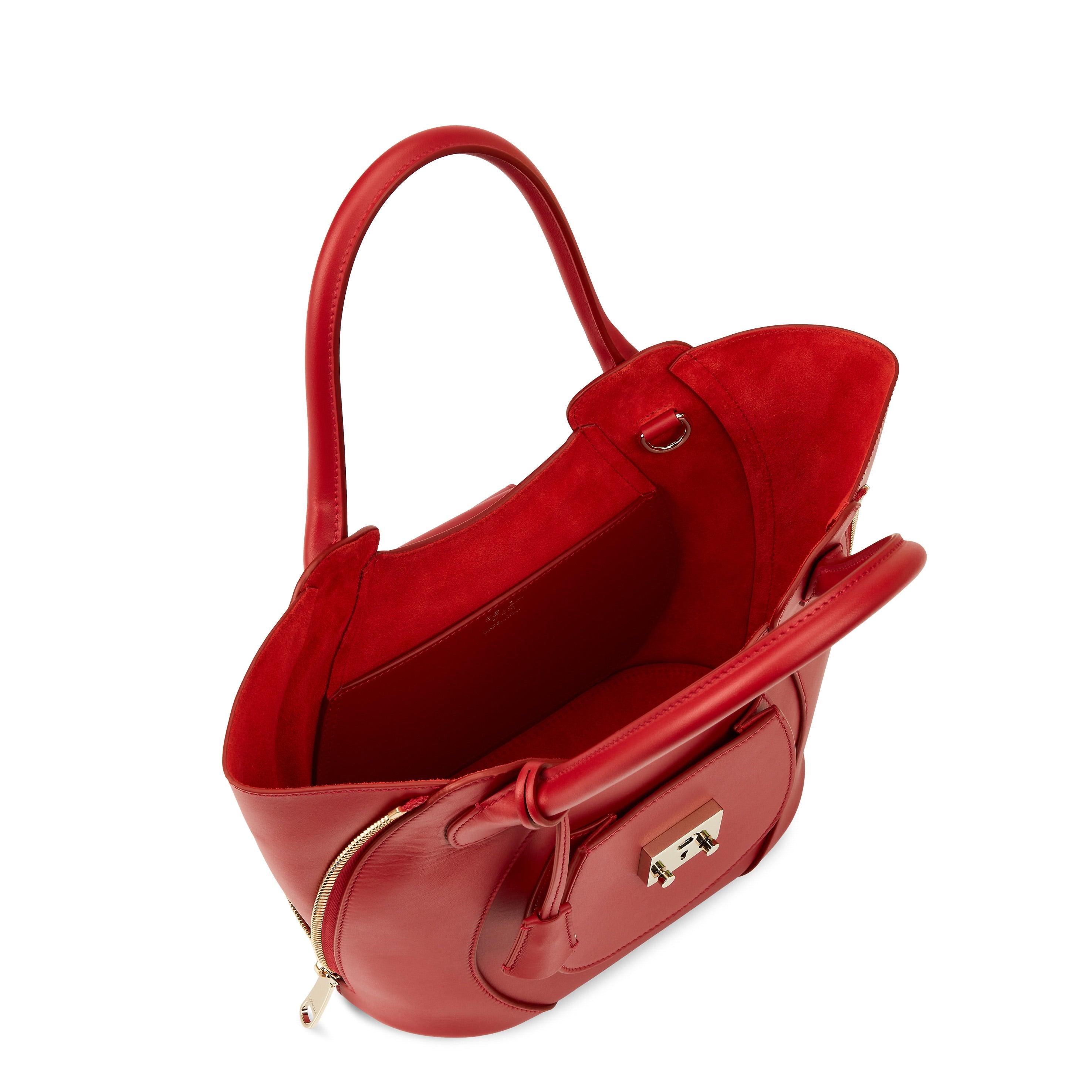 Red Luxury Designer Bag - Fusion of London's style and Italian craftsmanship.