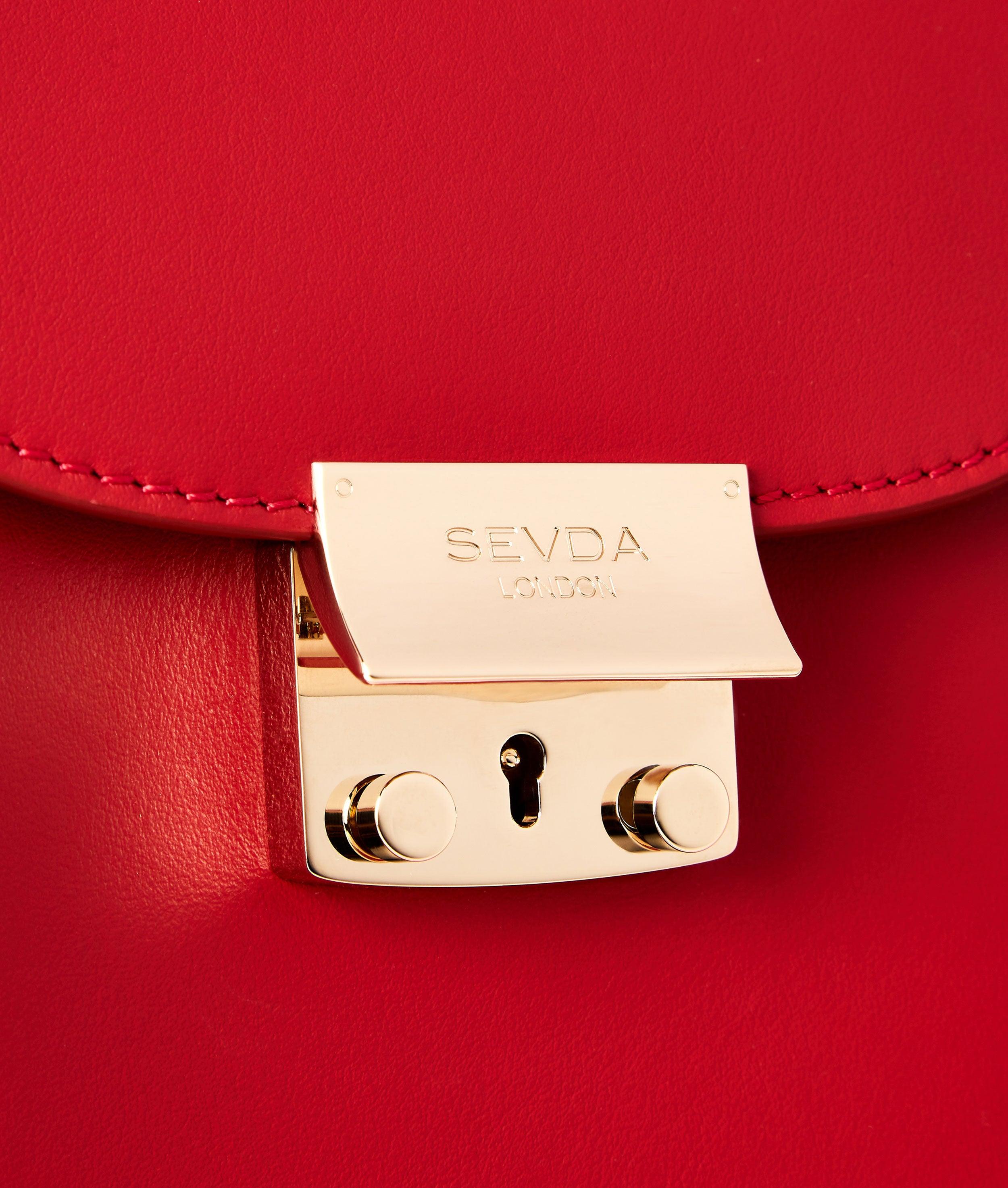 Red Luxury Designer Bag - Fusion of London's style and Italian craftsmanship.