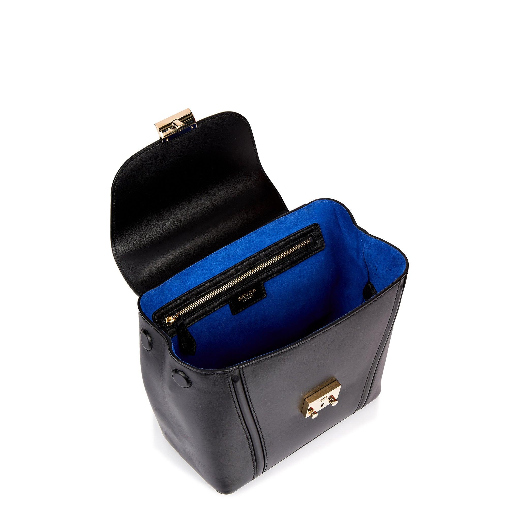 Small Black Top Handle Designer Bag - A fusion of elegance and craftsmanship, responsibly sourced.