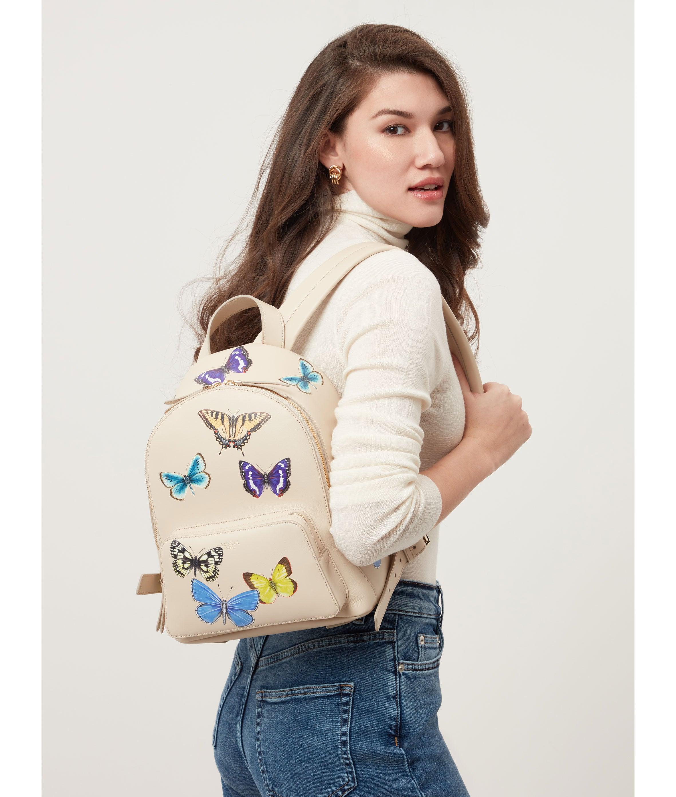 Ivory Backpack with Butterflies Print - The fusion of London's design and Italian craftsmanship.