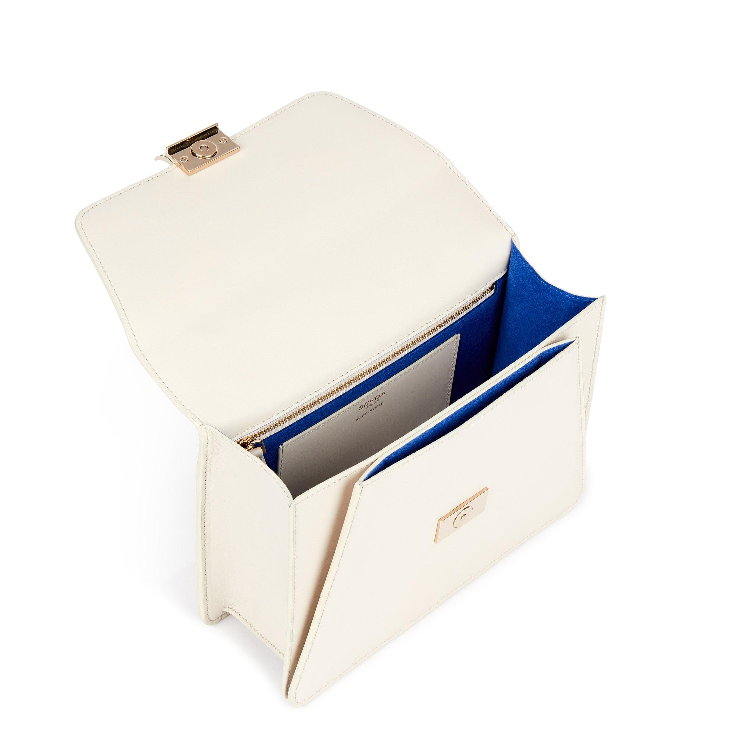 Off White Designer Shoulder Bag with Blue Suede Lining - The fusion of London style and Italian craftsmanship.