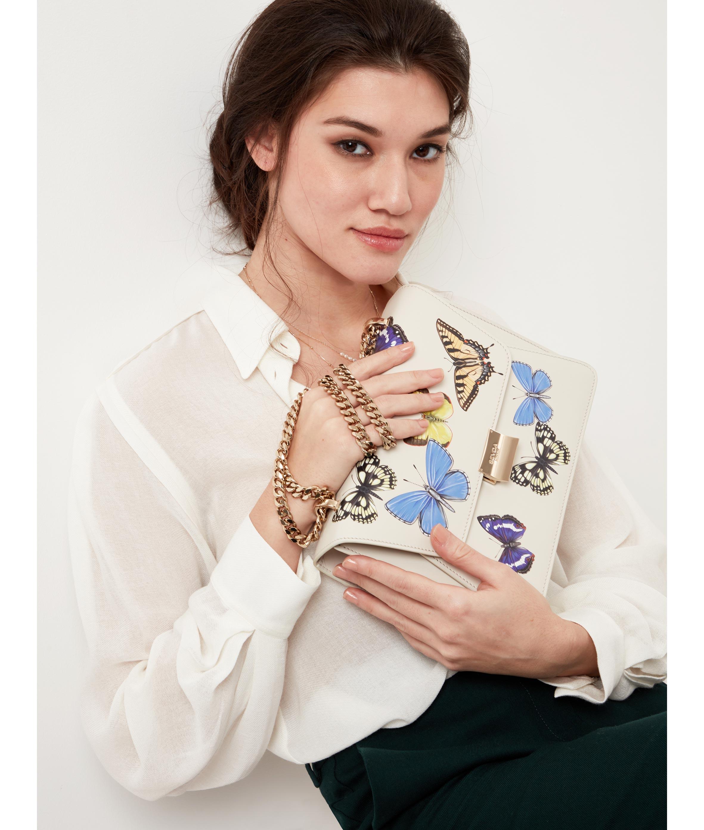 Off White Butterfly Designer Shoulder Bag with Gold Chain - A fusion of London's flair and Italian craftsmanship.