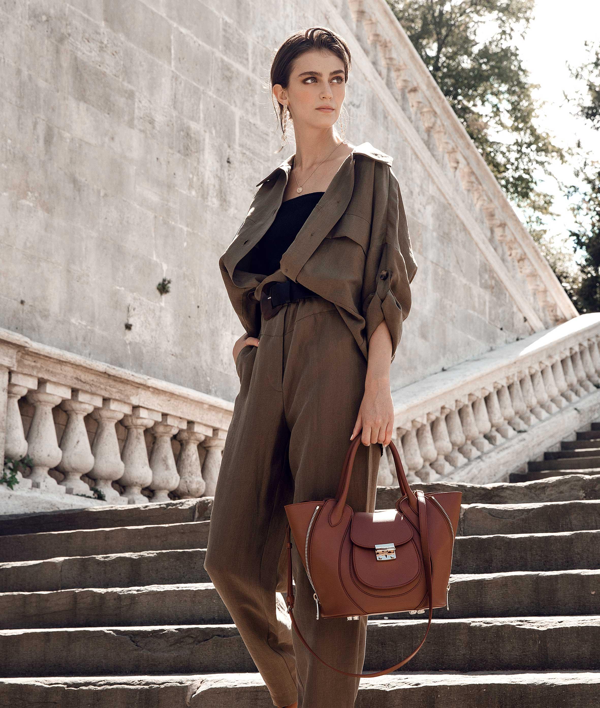 Tan Luxury Designer Bag - Marrying London's fashion with Italian craftsmanship, crafted from deforestation-free leather.